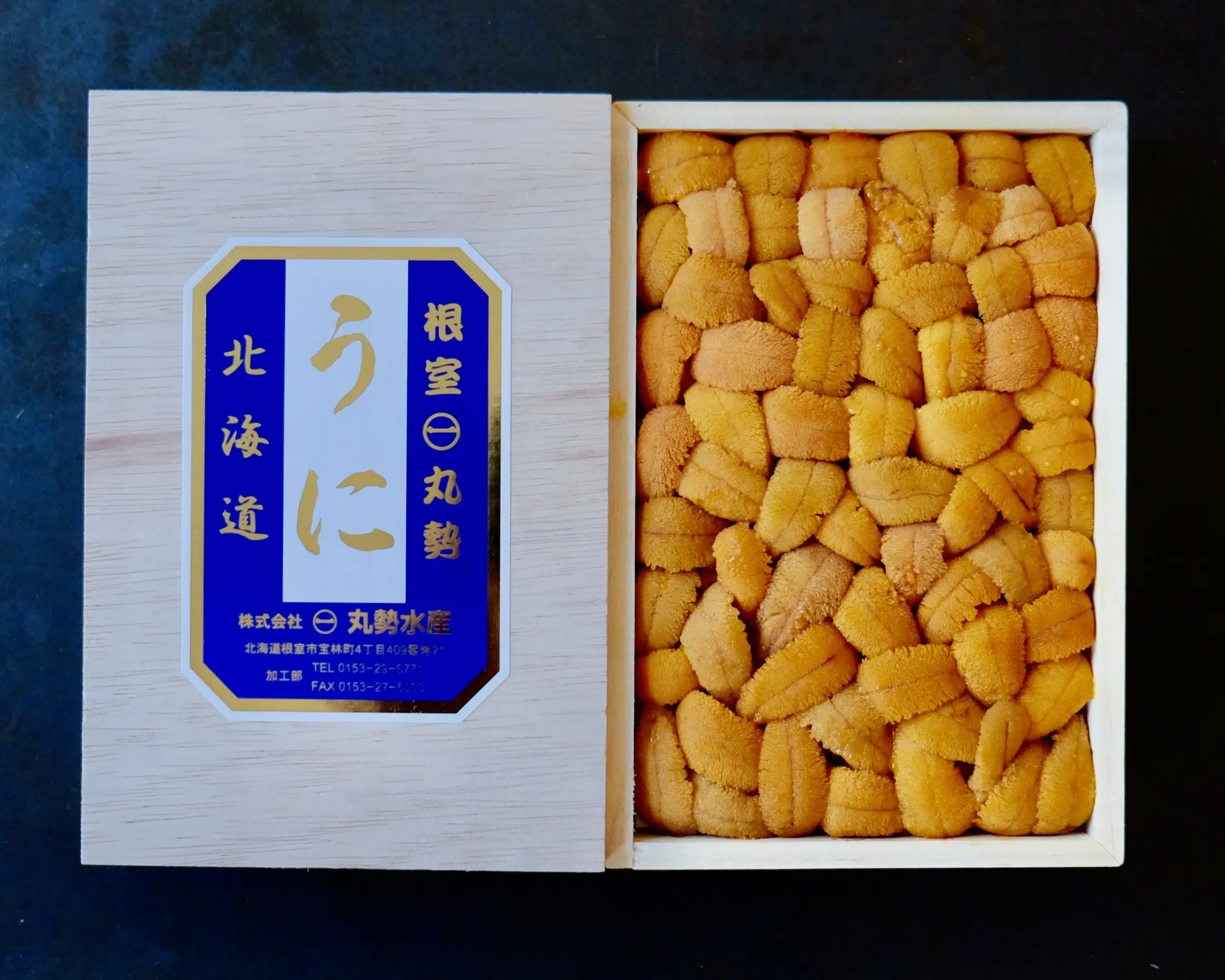 Female Hokkaido uni — bright yellow lobes